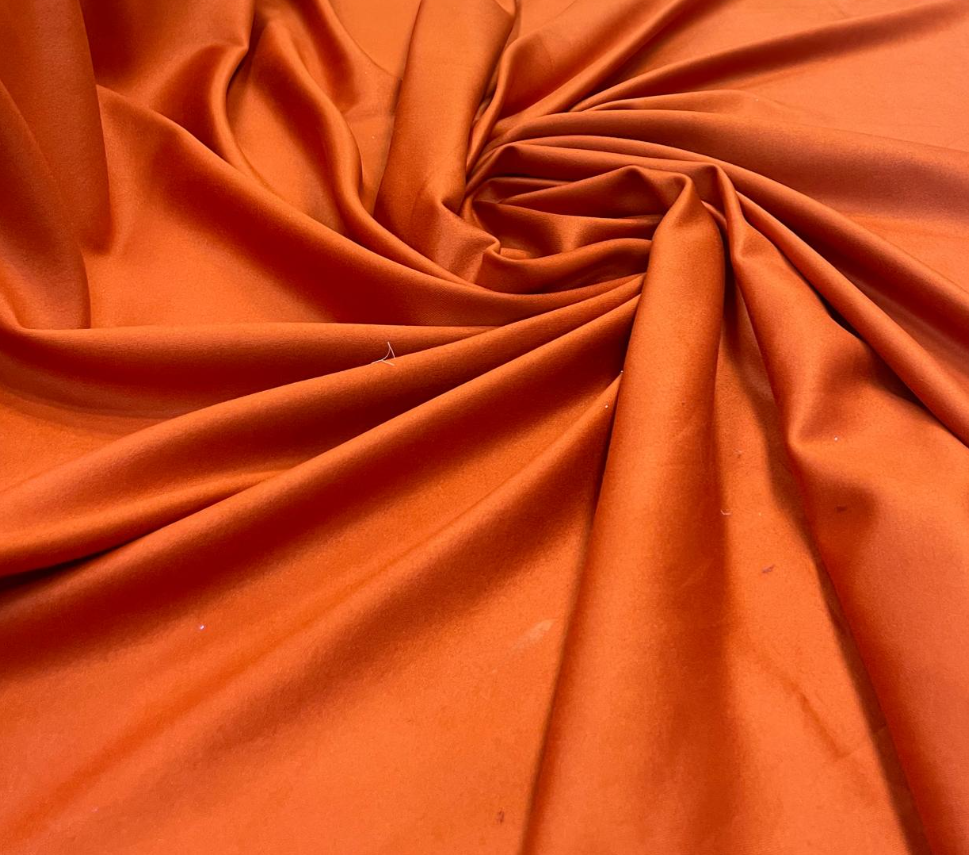 O que torna a malha scuba adequada para suas criações?